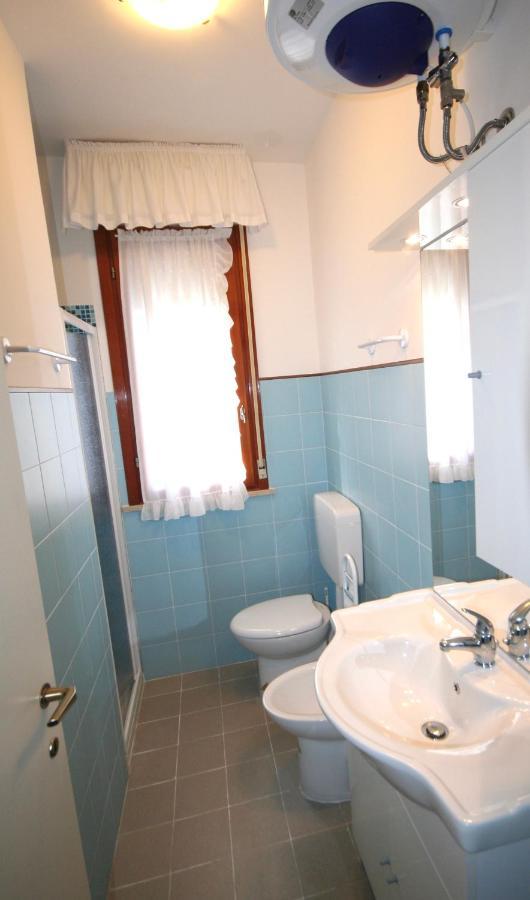 Ba- Althea - Piscina- Apartment Lignano Sabbiadoro Bagian luar foto